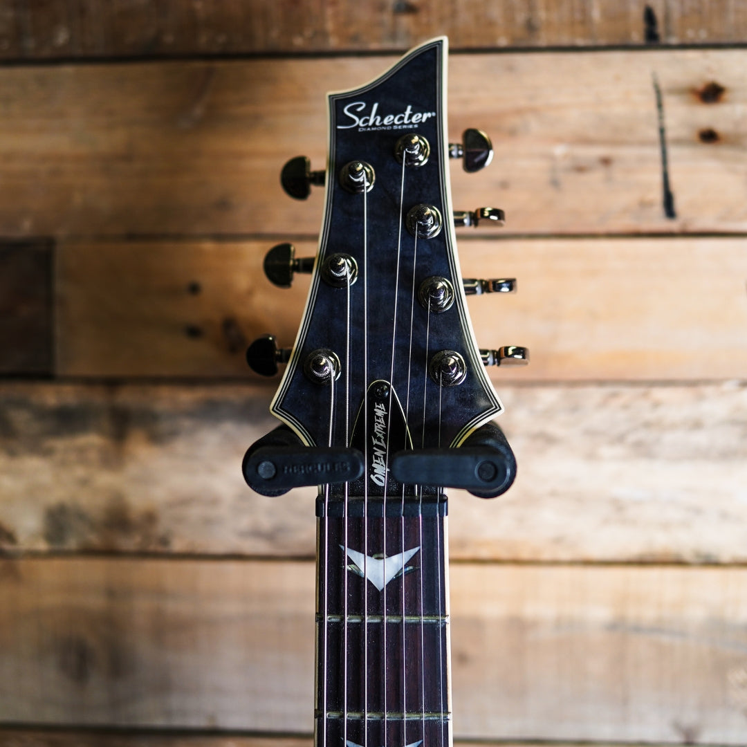 2024 Schecter Omen Extreme 7 in See-Thru Black – Fat Bottom Guitars